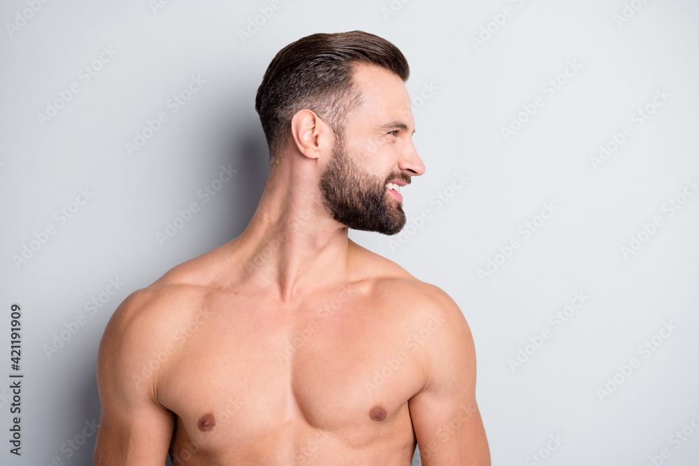 Photo of young man happy positive smile new haircut enjoy cosmetology procedure look empty space isolated over grey color background