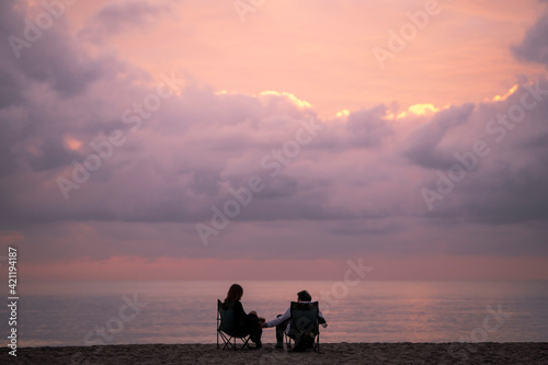 silhouette of a couple on the beach