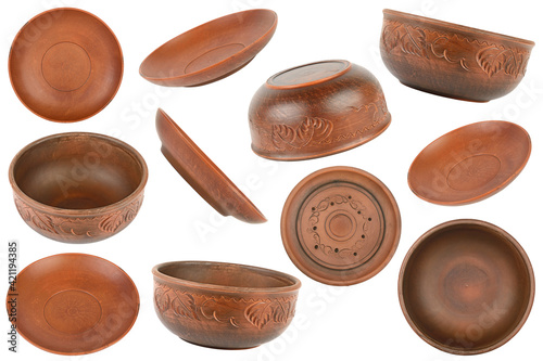 Set of ceramic plates from different angles isolated on white