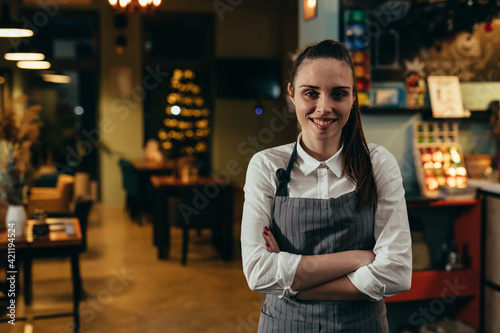 waitress posing in cafe or restaurant