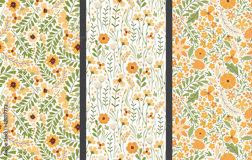 Wallpaper Mural Set of vector floral seamless patterns. Blooming summer meadow. Colorful different yellow wildflowers, leaves and stems on a white background. Liberty millefleurs. Hand drawn vector illustration. Torontodigital.ca