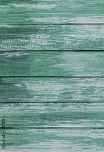 Texture wooden surface, old horizontal boards, blue-green paint, blank template for advertising lettering, rough material.