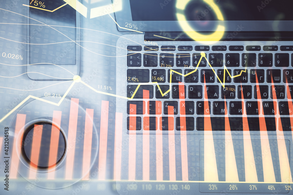 Obraz premium Stock market chart and top view computer on the table background. Multi exposure. Concept of financial analysis.