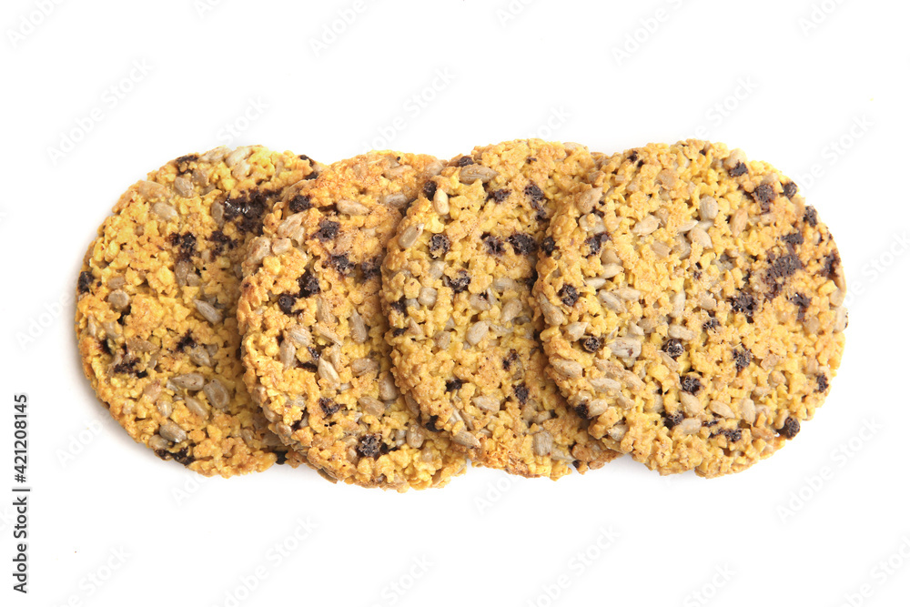 Corn flake cookies isolated on white background. Cornflake cookies with sunflower seeds, chocolate and condensed milk. Corn flake cookies isolated on white background. Cornflake cookies with sunflower seeds, chocolate and condensed milk.