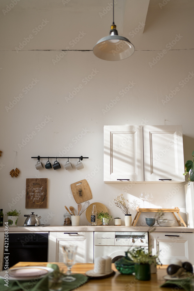 Beautiful modern kitchen. Home interior in the early morning Beautiful modern kitchen. Home interior in the early morning