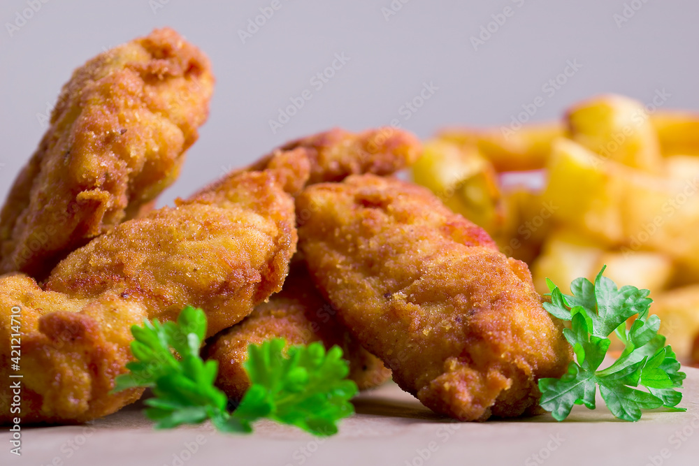 crispy chicken nuggets Crunchy homemade fries on a white napkin crispy chicken nuggets Crunchy homemade fries on a white napkin