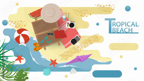 Vector illustration in a flat style on the theme of summer holidays and vacations on the shore of a tropical beach An open suitcase with things lies on the seashore