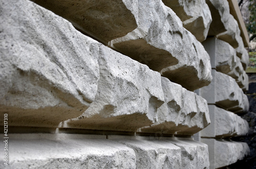 walls of the house from the 19th century formed by massive blocks of plaster bosses as reminiscences of  Italian Renaissance and its famous palaces and bastions. deep joints between stones like cliff photo