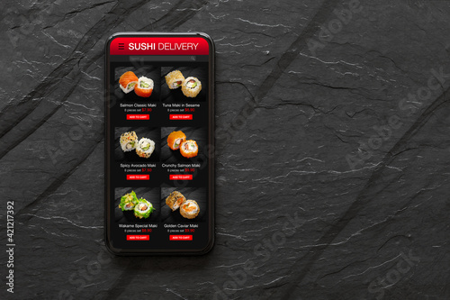 Mobile phone with sushi or food online ordering website mockup