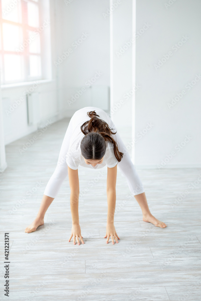 pregnant yoga model working out, in Prenatal downward-facing dog pose pregnant yoga model working out, in Prenatal downward-facing dog pose