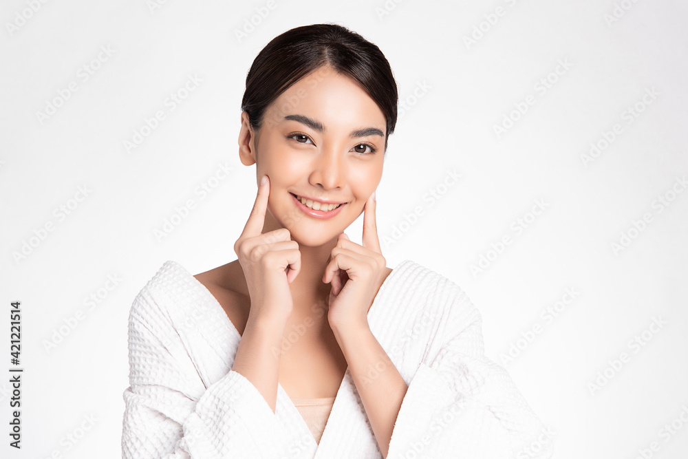Beautiful young asian woman with clean fresh skin on white background, Face care, Facial treatment, Cosmetology, beauty and spa, Asian women portrait Beautiful young asian woman with clean fresh skin on white background, Face care, Facial treatment, Cosmetology, beauty and spa, Asian women portrait