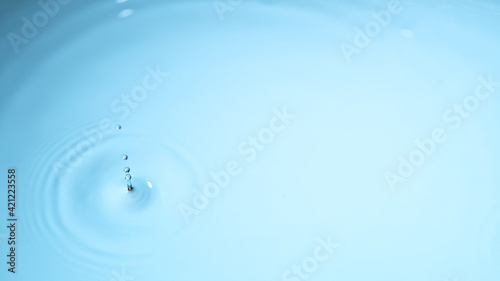 Water drops falling on wate...