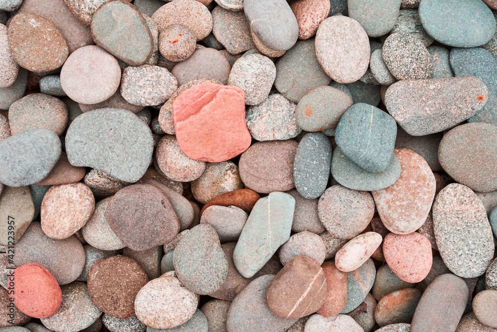 Pebbles texture. Colored round stones background Pebbles texture. Colored round stones background