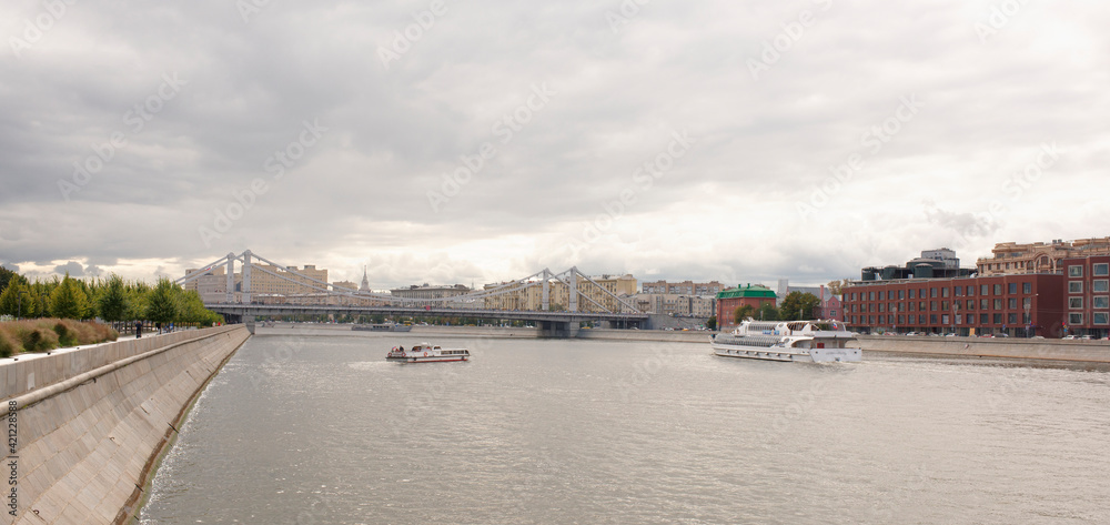  Passenger vessels with tourists on board float on the Moscow-river
