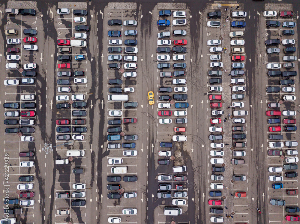 Cars in the parking lot. Aerial drone top view. Cars in the parking lot. Aerial drone top view.