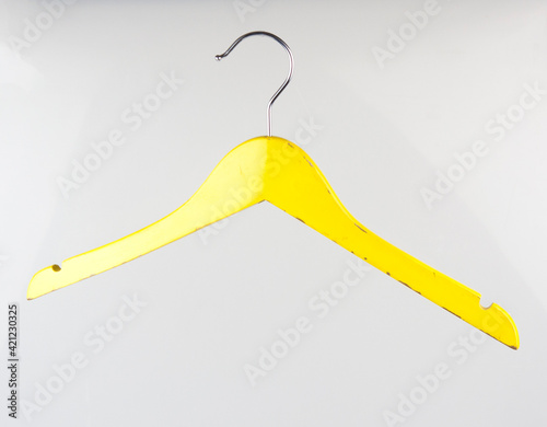 Empty cloth hanger on white background photo