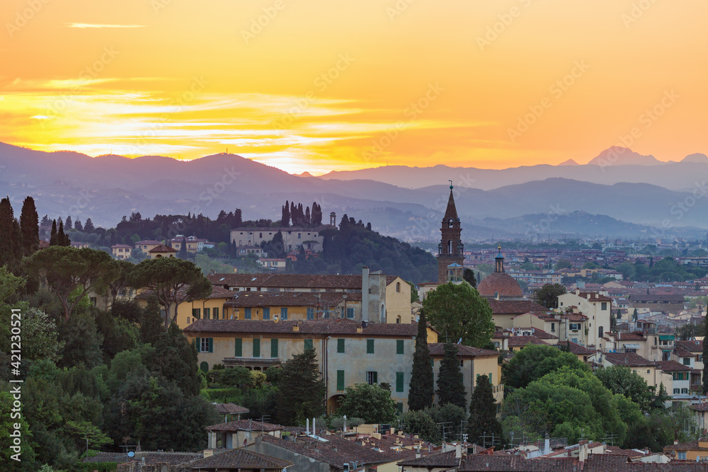 Cityscape view at Florence in evening light with the mountains