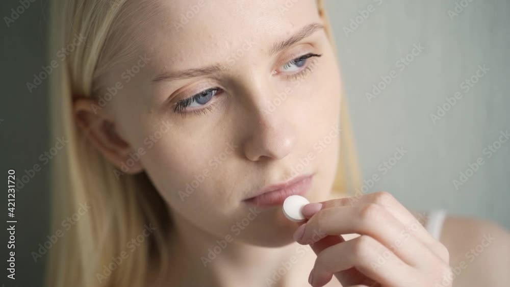 pregnant woman taking medicine painkiller pills pouring on female hand capsules from meds bottle. health care, medicare, pharmacy and treatment concept, close up view pregnant woman taking medicine painkiller pills pouring on female hand capsules from meds bottle. health care, medicare, pharmacy and treatment concept, close up view