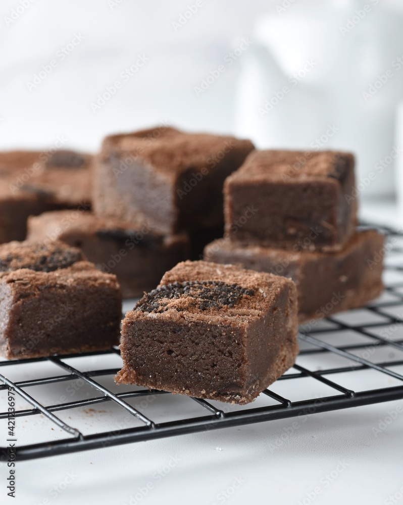 Homemade fudgy chocolate brownies on white background. Homemade fudgy chocolate brownies on white background.