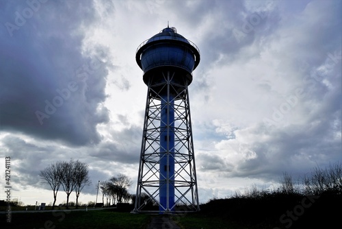 Wasserturm in Ahlen. Industriedenkmal und ein Wahrzeichen der Stadt Ahlen im Münsterland. Kugelförmiger Wasserhochbehälter photo