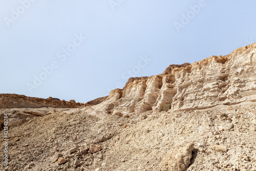 Sandy mountains in the desert on the shores of the Dead Sea in Israel