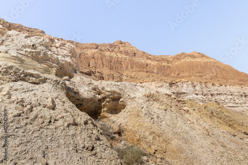Sandy mountains in the desert on the shores of the Dead Sea in Israel