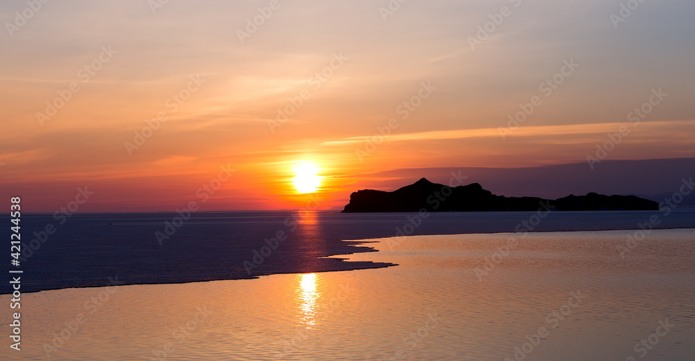 Sunrise over the lake Baikal. Early morning landscape. Sunrise over the lake Baikal. Early morning landscape.