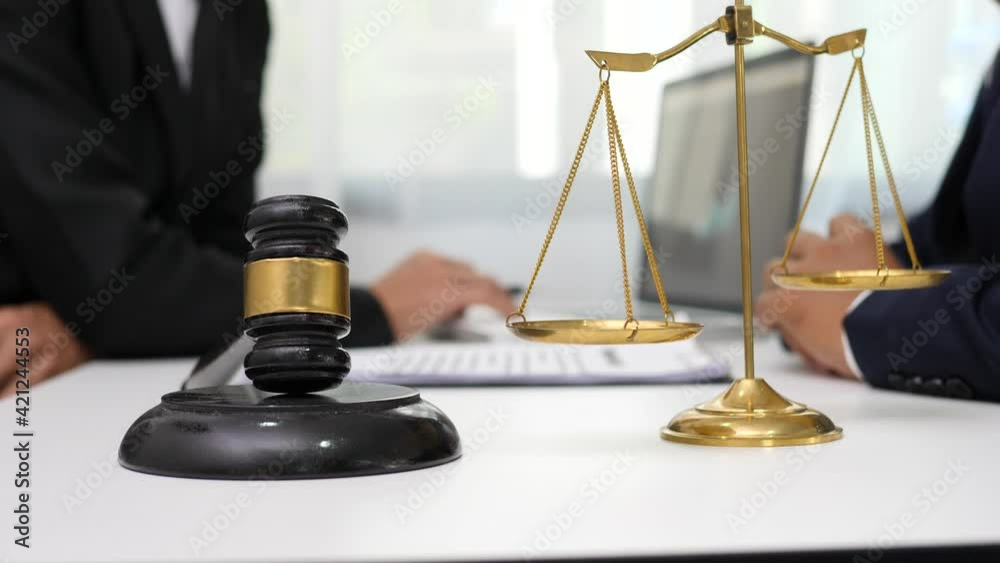 Judge gavel with Justice lawyers having team Concepts of Law and Legal services Judge gavel with Justice lawyers having team Concepts of Law and Legal services