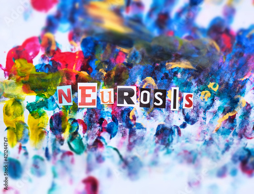 Word writing text Neurosis from cut letters on abstract strokes bright colorful  background. Headline , card of psychology . Psychologic concept.