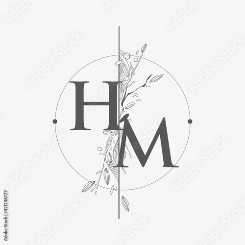 Letter HM Initial Logo with Hand Draw Floral, Initial Wedding Font Logo with Circle and Flowers.