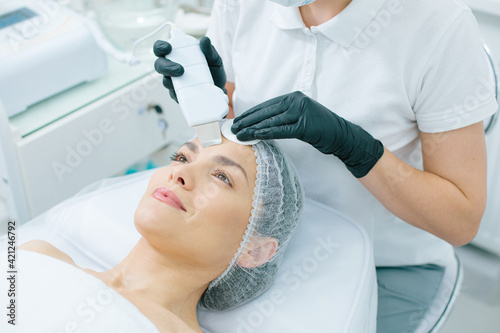 Painless procedure of cleaning pores on the facial skin