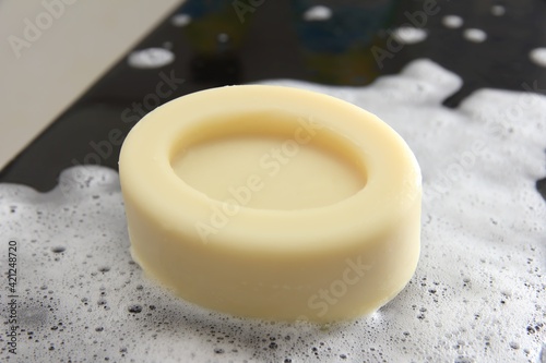 Mockup oval shape soap on foam bubbles