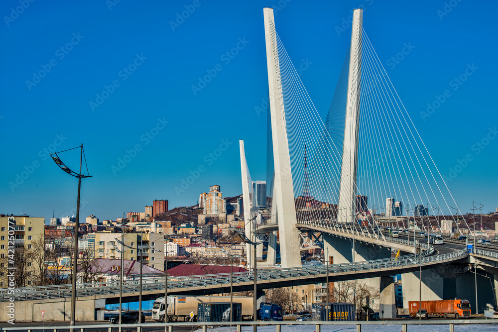 golden bridge in Vladivostok city on a clear, sunny day 