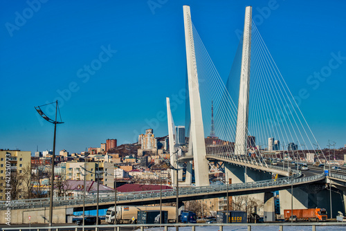 golden bridge in Vladivostok city on a clear, sunny day 