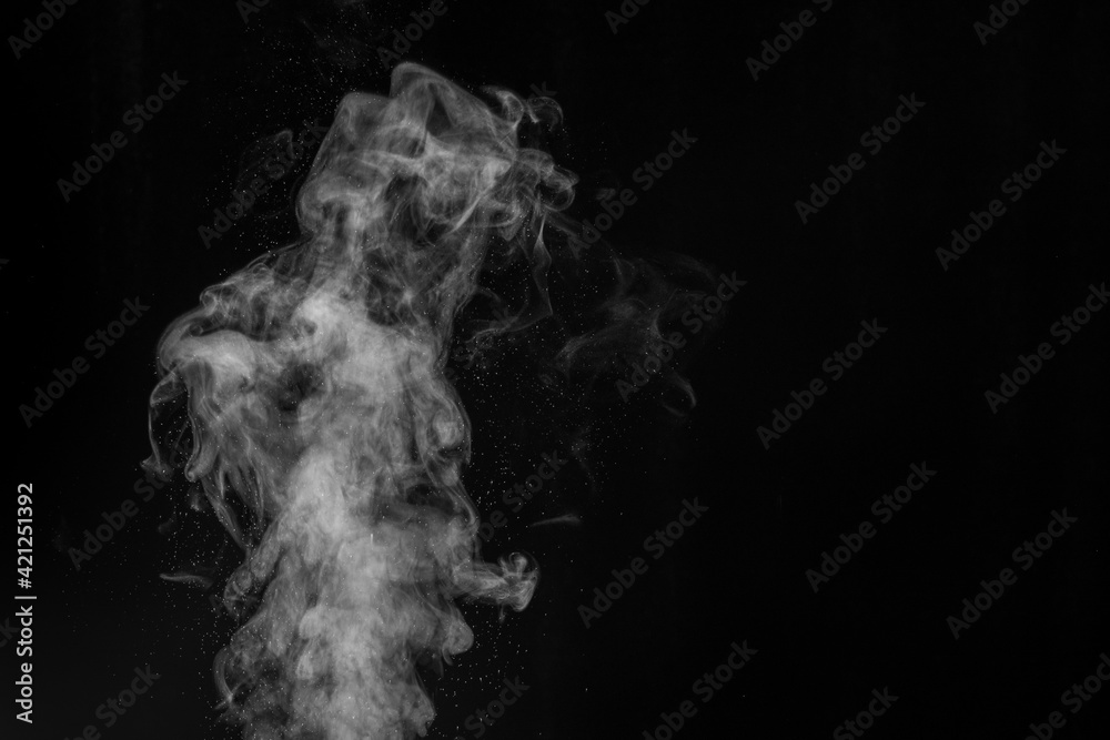 Smoke fragments on a black background. Abstract background, design element, for overlay on pictures Smoke fragments on a black background. Abstract background, design element, for overlay on pictures
