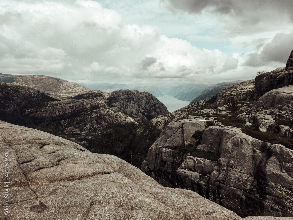 clouds over the mountains. canyon. fjord. view from the top of mountain