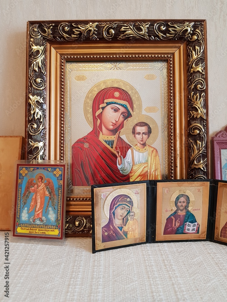 Fototapeta premium Antique Orthodox Christian icons on the shelf