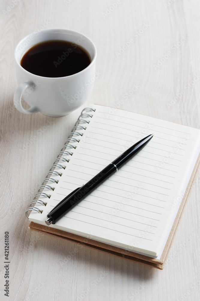 Notepad and pen with coffee Notepad and pen with coffee