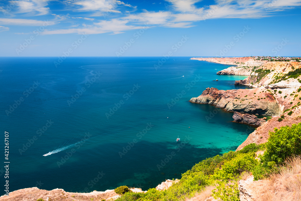 Beautiful sea coast with turquoise water and rocks. Summer seascape. Fiolent Cape, Crimea