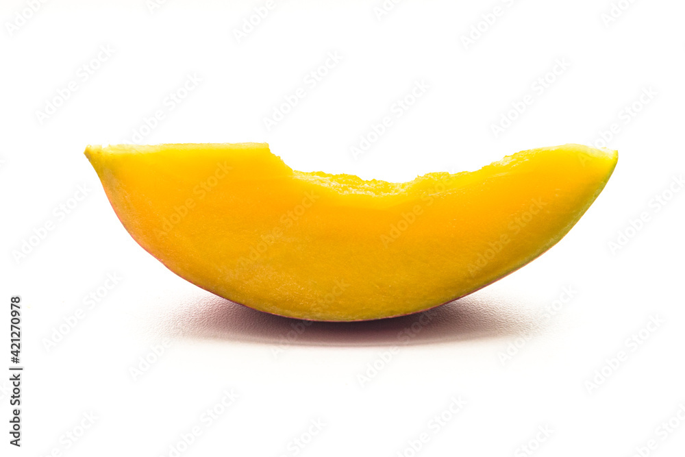 Mango fruit cut on two. Mango pulp and pit macro photo. Tropical fruit close up Mango fruit cut on two. Mango pulp and pit macro photo. Tropical fruit close up