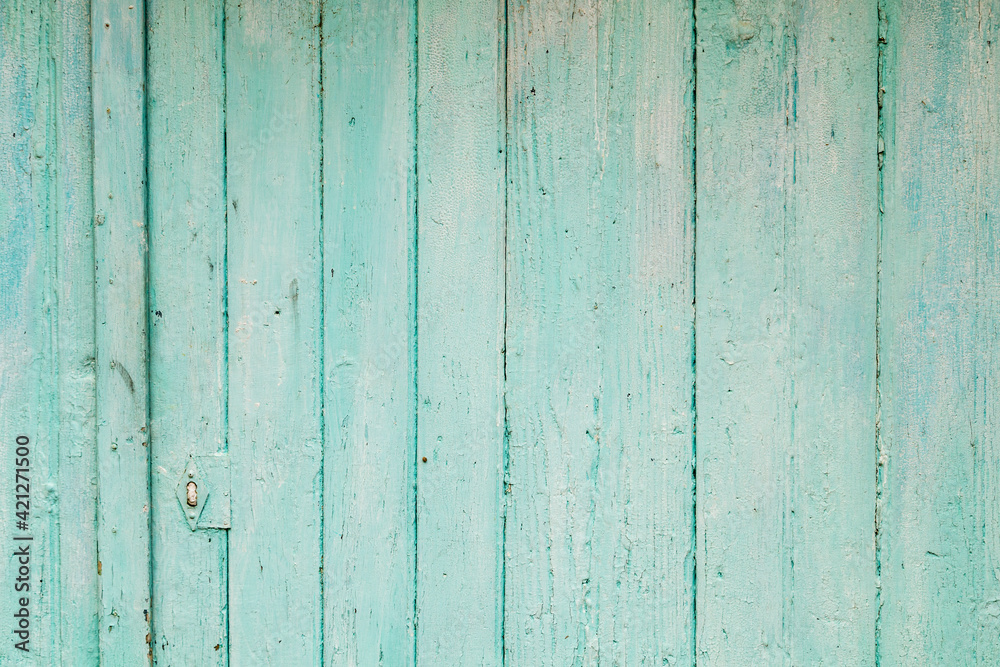 Fototapeta premium pattern of green painted old damaged soft wood