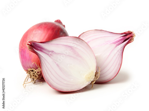 onions and sliced onions on a white background