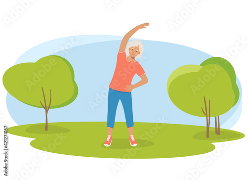 Elderly woman in sports clothes does exercises in the park. Retired grandmother, a pension and a healthy lifestyle.