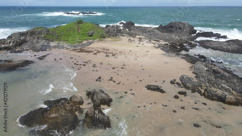 Outcrops At Sawtell Beach With Blue Sea In Summer - Empty Beach In Sydney, NSW, Australia. - aerial photo