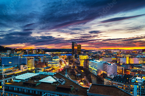 A night view of Sentrum area of Oslo, Norway, with modern and historical buildings