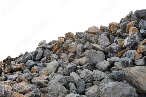 Piles of gravel limestone rock on construction site, isolated on white background with clipping 