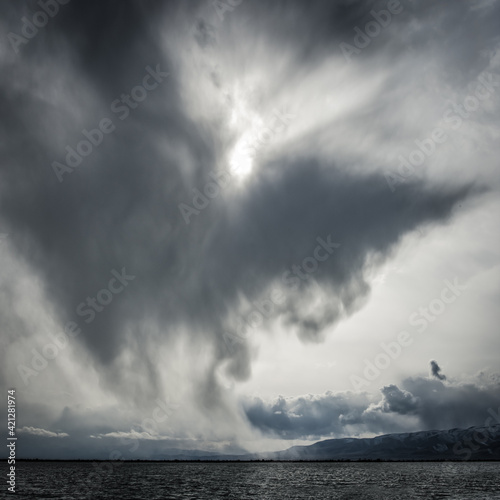 Dark cloud over lake