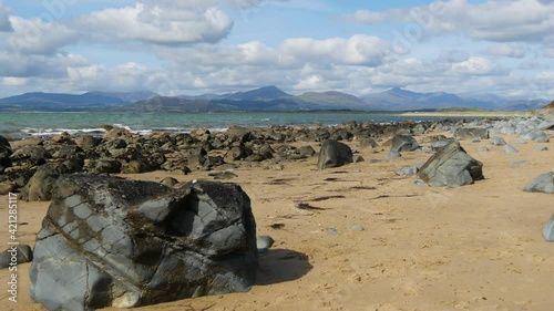 Wide Shot of Rocky coastline No 8, looking towards the Llyn Peninsula from near Morfa Dyffryn, Wales, UK, Static Camera, 10 Second version photo