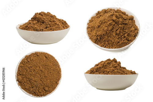 Mix spices in a bowl isolated on white.