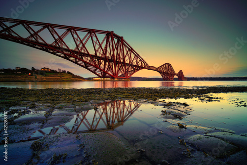 the forth rail bridge at dusk, fife, scotland.